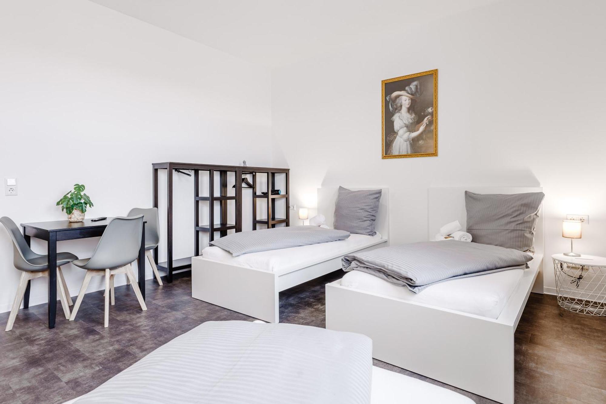Dreibettzimmer mit Gemeinschaftsbad